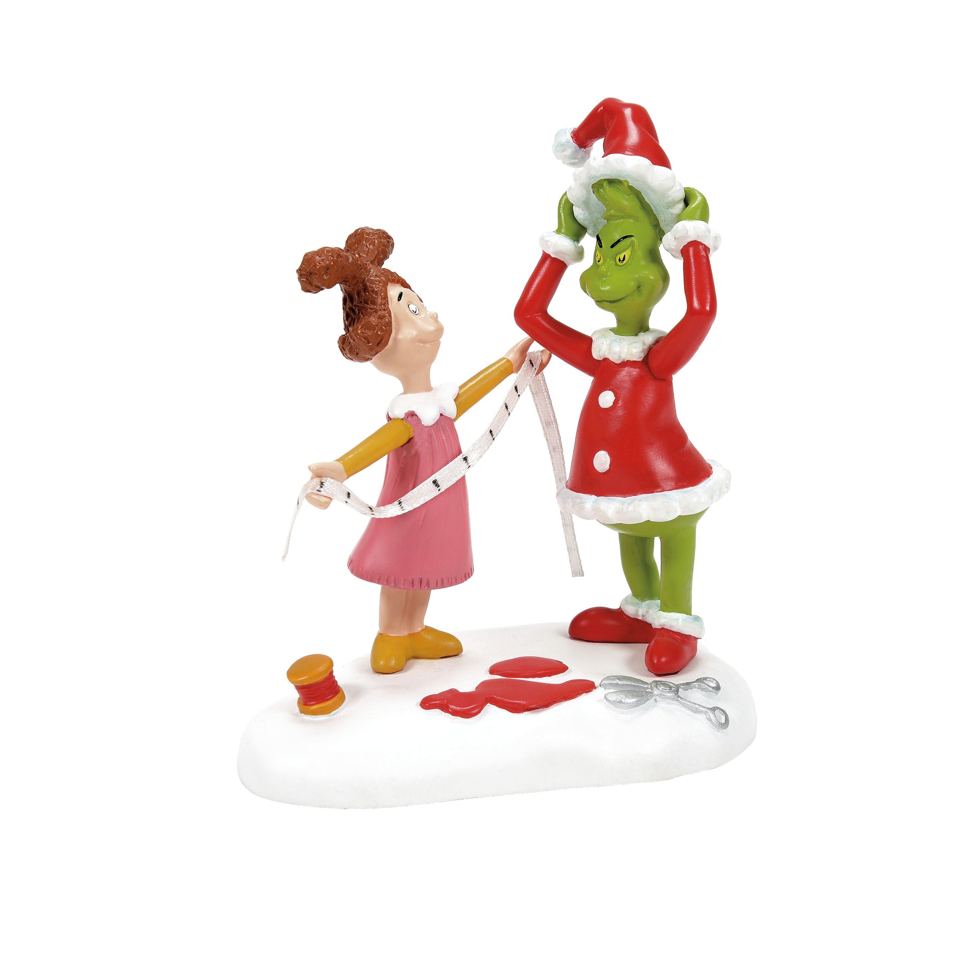 Grinch Village Being Fitted for a Santy Suit