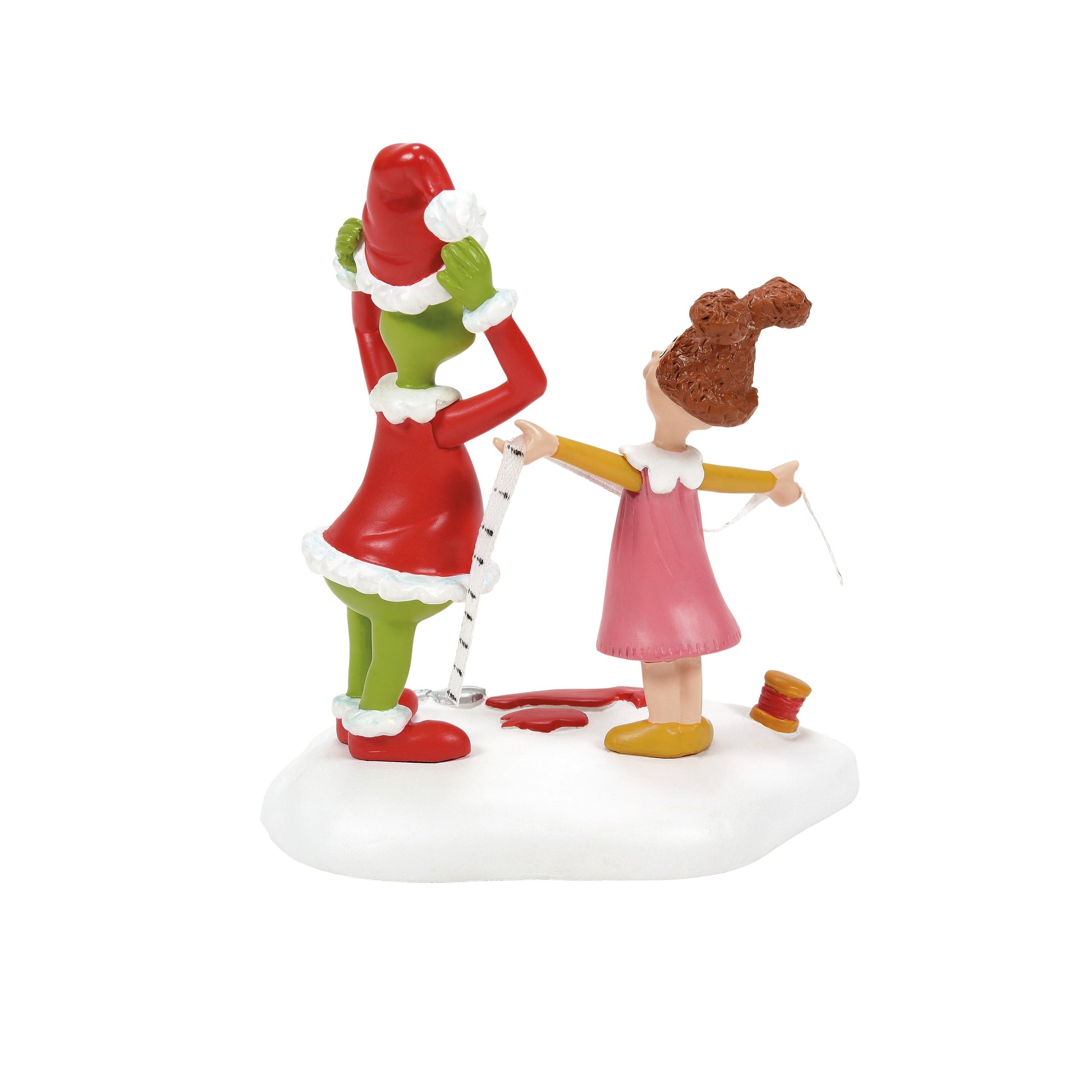 Grinch Village Being Fitted for a Santy Suit