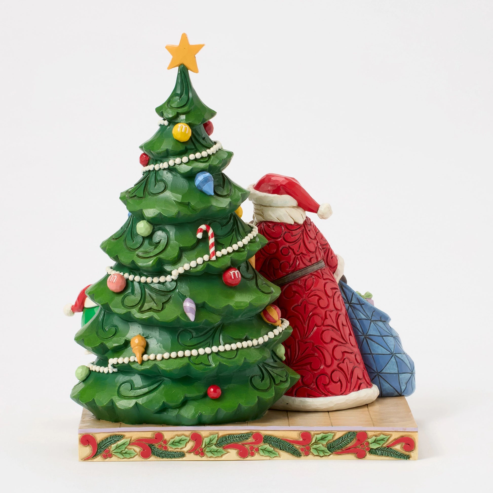 Santa with M&Ms "He Exists" by Jim Shore